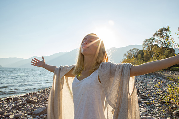 Image of a person standing in the sunshine